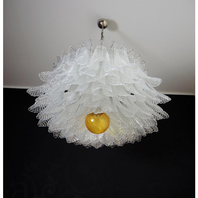 Italian vintage chandelier in murano glass and nickel plated metal structure. The armor polished nickel supports 100 large...