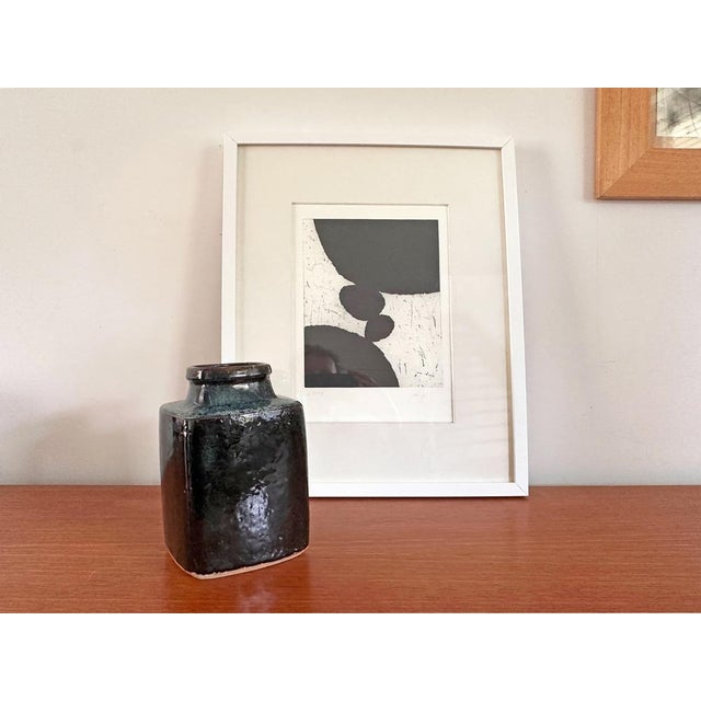 Decorative stoneware vase by Danish ceramicist Jytte Trebbien, produced during the 1970s. The vase features a compact...