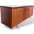 A sleek and well-proportioned Italian sideboard by Calligaris, combining warm cherrywood tones with crisp chrome...