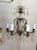 Early 20th century heavy gilt metal and crystal chandelier with unusual swirl glass in the center. This chandelier was 6...