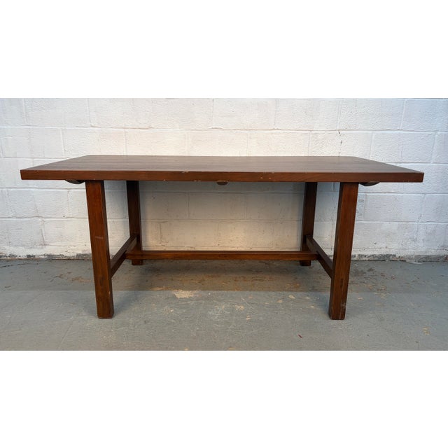 This is a handsome mid-century modern (MCM) rectangular table, likely dating from the 1960s. It features a minimalist,...