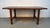 This is a handsome mid-century modern (MCM) rectangular table, likely dating from the 1960s. It features a minimalist,...