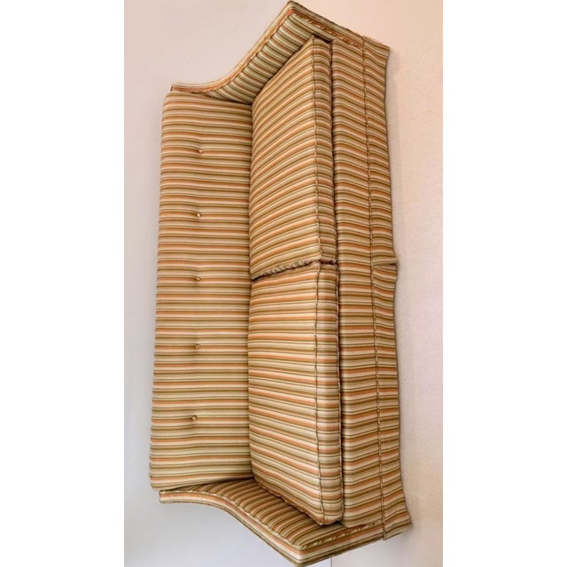 Beautiful custom 3-seater sofa with a tight back and two seat cushions. Original fabric and custom designed by Frazier's...