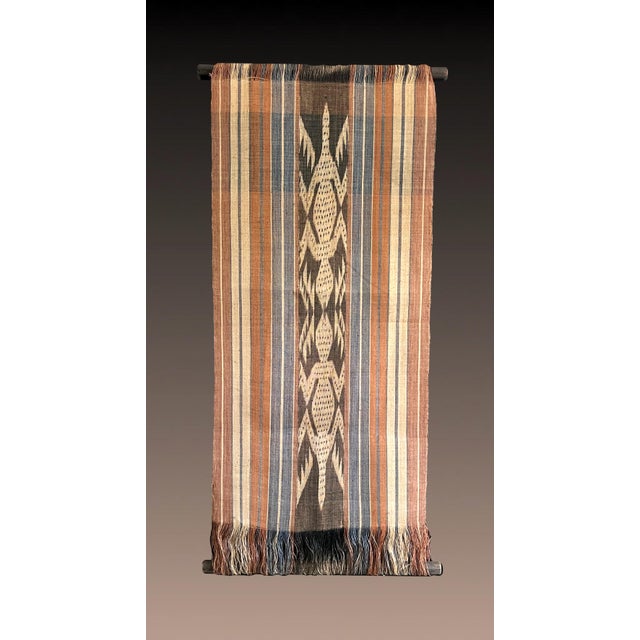 Eye catching hand woven Ikat wall hanging or panel made from natural palm fibre with natural dyes from the 1970's. Outer...