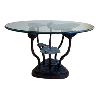 Round glass top with Iron base Table For Sale