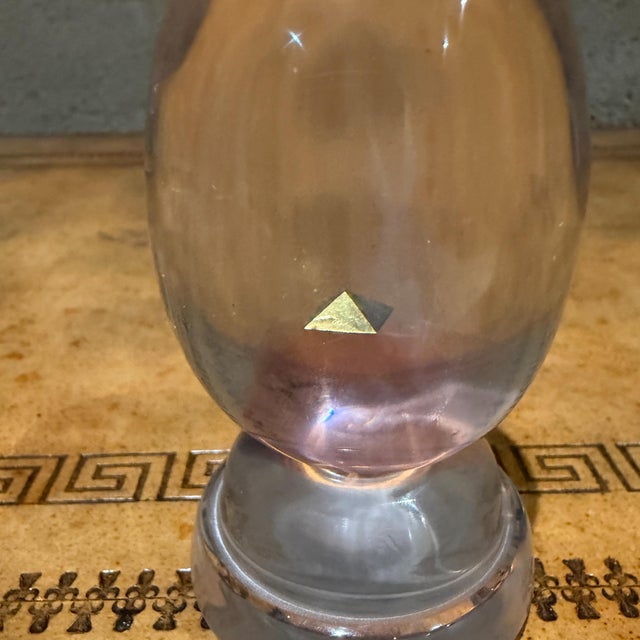 For your consideration a vintage sculpture of a lucite in the shape of an egg in matching stand. The sculpture featured a...