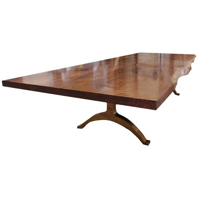 Hand made live edge walnut dining table with a bronze base. The price shown reflects a 120" x 40" wide walnut top with a...