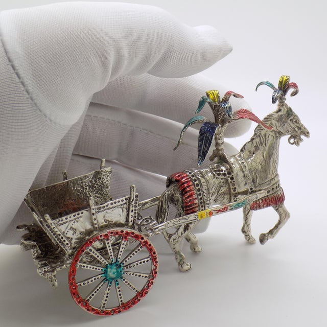 A detailed vintage figurine depicting a large traditional sicilian carriage, handmade in italy during the 1980s to 1990s...
