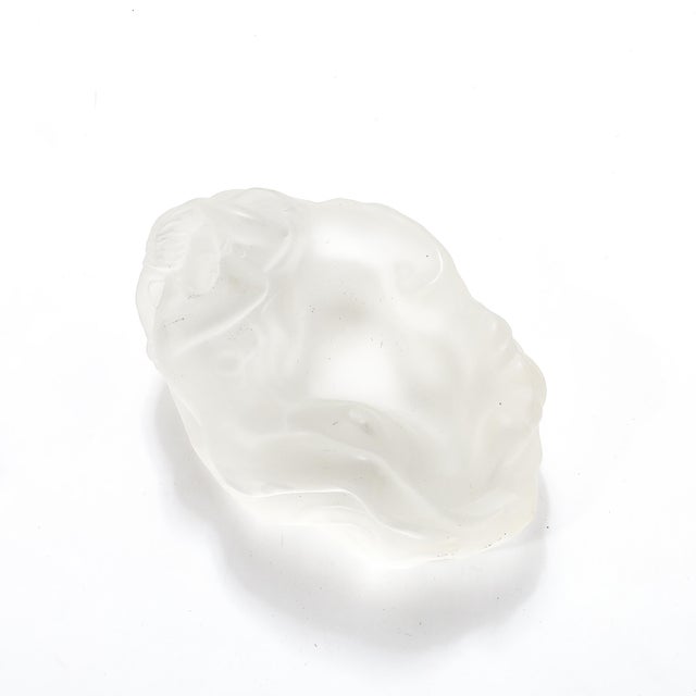 The Mid-Century Modernist frosted glass "Sleeping Beauty" sculptural nude dish, signed R. Lalique, France, circa 1960, is...