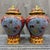 A beautiful pair of Chinese Cloisonné Enamel "General Jars." These vibrant vessels feature a central panel of colorful koi...