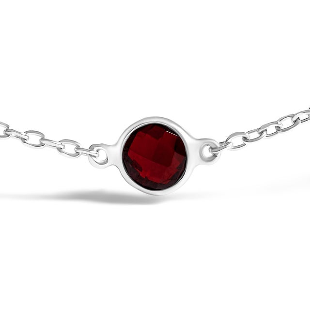 Embrace timeless elegance with this exquisite bolo bracelet, delicately crafted from rhodium-plated .925 sterling silver....