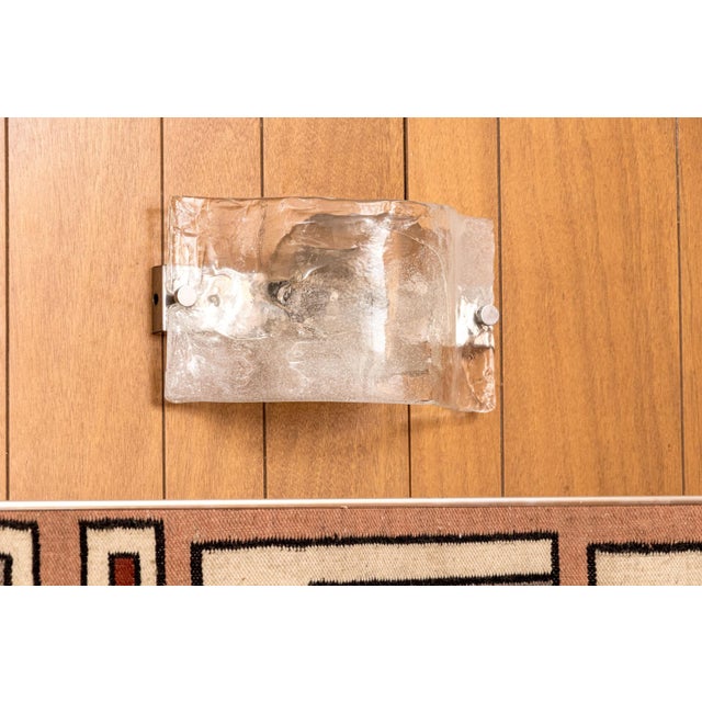 Designed by Carlo Nason for Mazzega in the 1960s, this sconce embodies the timeless dialogue between Italian craftsmanship...