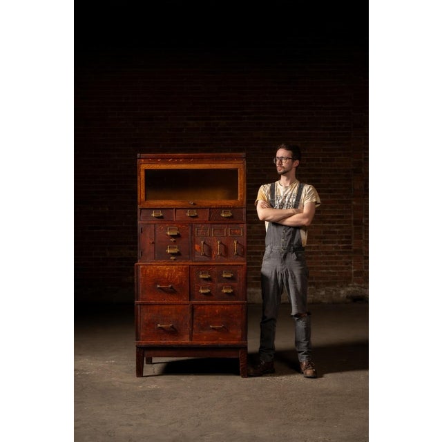 c. 1910s-1920s; Yawman & Erbe Mfg. Co., Rochester, NY A monumental modular oak barrister cabinet by Yawman & Erbe, one of...