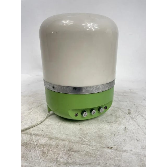 Beautiful 1960s Europhone designer lamp in pistachio green, made in Italy. In working order. An excellent decorative item....