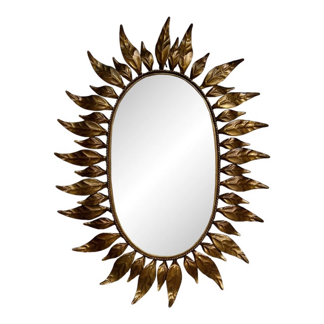Spanish Oval Gilt Metal Sunburst Mirror With Alternating Leaves For Sale