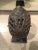 A Bamun prestige cuff from Cameroon. Made in the lost wax method from a bronze alloy, the pattern is completely unique and...