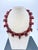 A striking mid‑century Baltic amber necklace featuring hand‑cut cognac slabs, each showcasing natural inclusions and rich...