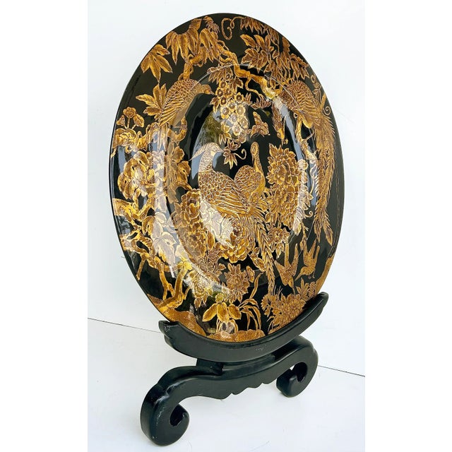 Large Asian Black Lacquer Gilt Wood "Bird" Charger on Stand, Hand Painted Offered for sale is a large Asian hand-painted...