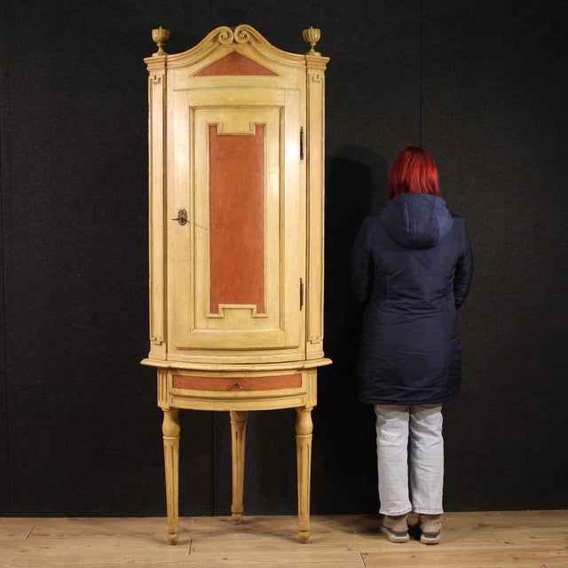Antique Piedmontese corner cabinet from the second half of the 18th century. Finely lacquered and painted Louis XVI...