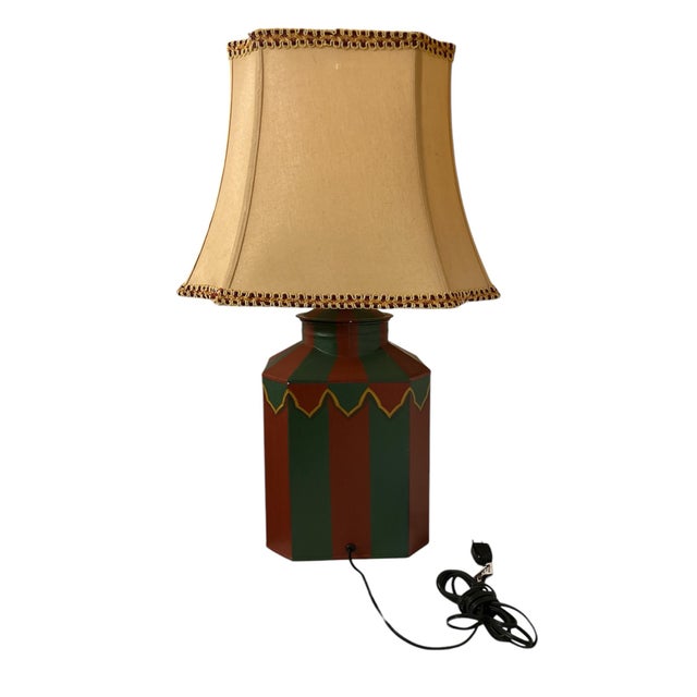 Wonderful role lamp painted in Trompe L'oeil style. It looks like a medieval red and green striped tent opened up to...