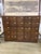 Large antique oak card catalog cabinet featuring 25 drawers with original brass label holders and pulls. Beautiful aged...