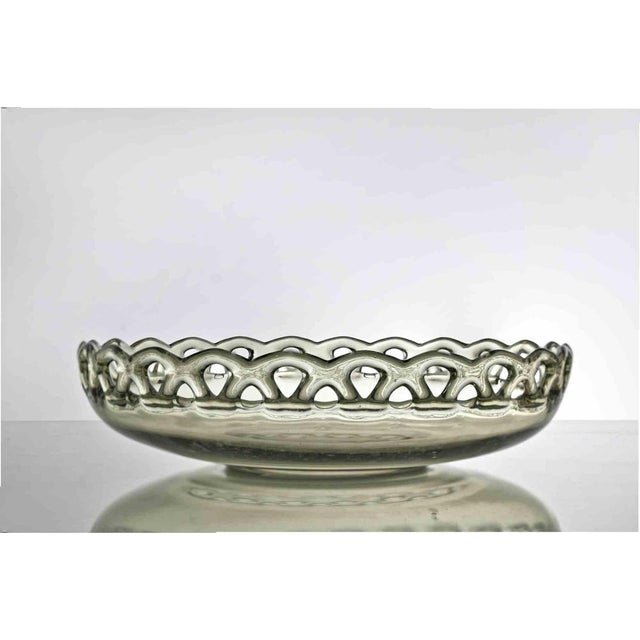 Vintage Art Glass Plate realized in Italy in 1970. Transparent beige with yellow nuances. Very good condition.