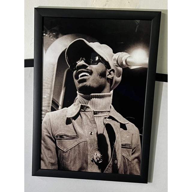 A pair of photography print in black and white of one of the most recognized and accomplished American artists , Stevie...