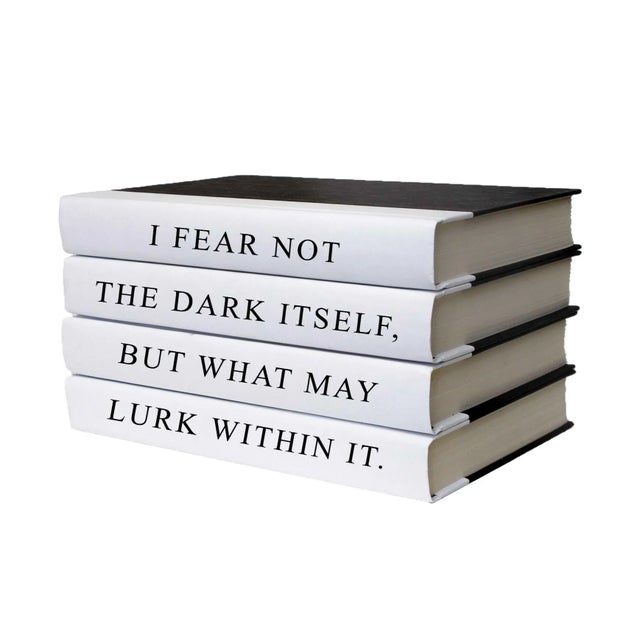 Let your thoughts be seen with these four Decorative hardback books in black with white spines.
