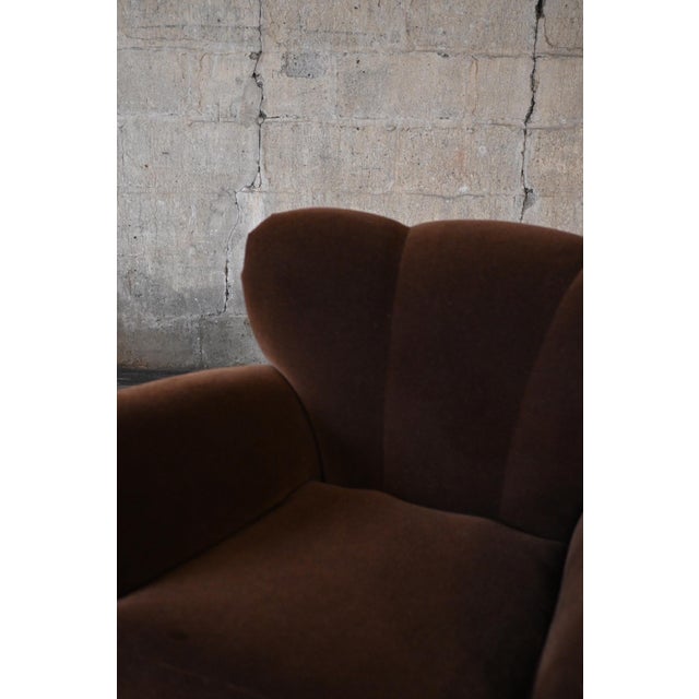 A beautiful, substantial Deco era armchair by the acclaimed Guglielmo Ulrich. Subtle large-scale channel back design with...