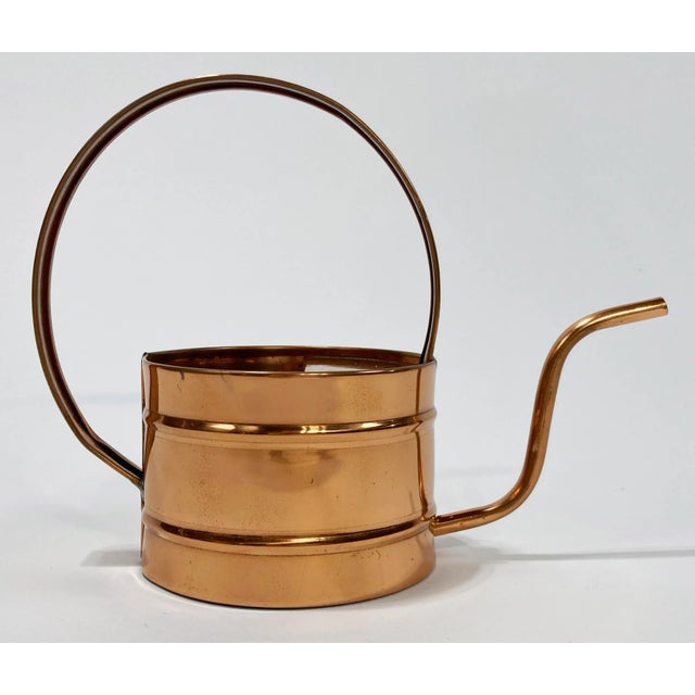 Vintage sculptural copper watering can. Lovely patina.