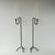 Vintage mid 20th century sculptural wrought iron candle holders. Hand forged in black wrought iron, this pair of candle...