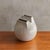 An Italian Whistle vase designed by Franco Bucci for Laboratorio Pesaro in the 1970s. This striking ceramic vessel...