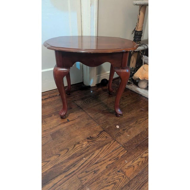 Bring classic traditional elegance to your living space with this vintage oval end table. Beautifully crafted from solid...