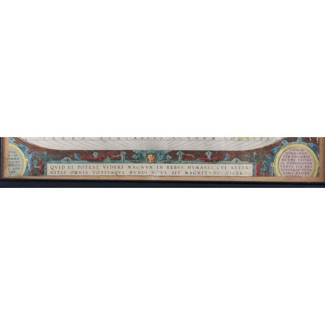 This is a framed, high-quality reproduction of Abraham Ortelius's iconic world map, Typus Orbis Terrarum, which first...