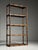 Faux Bamboo bookshelf / bookcase. Solid wood frame with a faux bamboo motif. The shelves are made of webbing and glass....