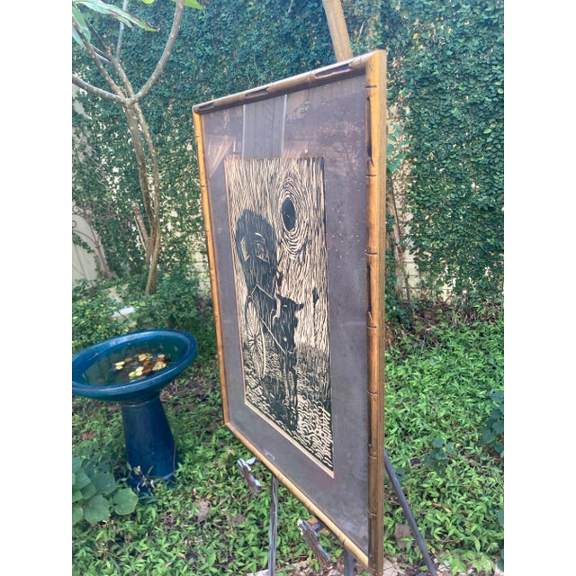 Nicely executed linocut print of an ox drawn cart in the rain. Signed and titled by the artist. Numbered 27/50....