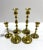 A versatile set of six vintage brass candlesticks in three graduated heights, with two of each size. Classic turned...