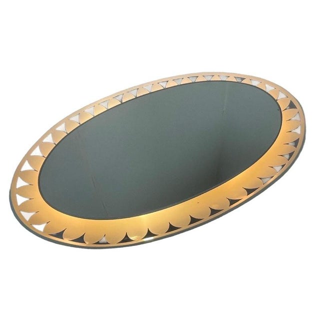Space age / Pop Art design backlit mirror made by the German company Hillebrand. A highly sought after mirror due to it’s...