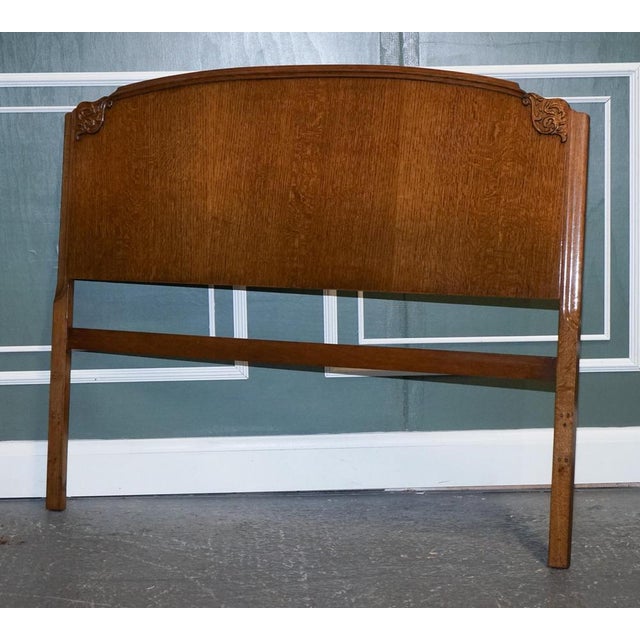 Vintage Art Deco oak double-carved headboard. We have deep cleaned, hand waxed and hand polished it. Condition-wise, there...