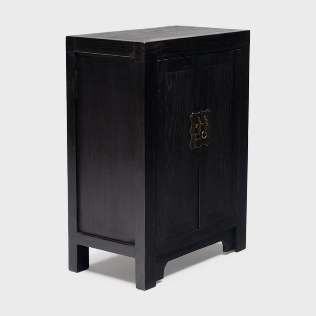 Perfecting line and proportion, the simple design of this low locking chest celebrates the restraint of classic Chinese...