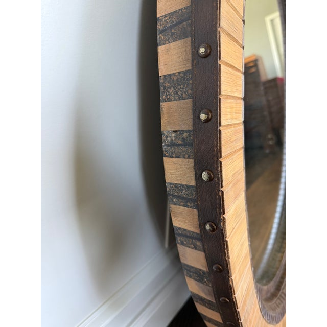 Striking vintage round wall mirror by Magnussen Furniture, part of their sought-after Presidential collection. This piece...