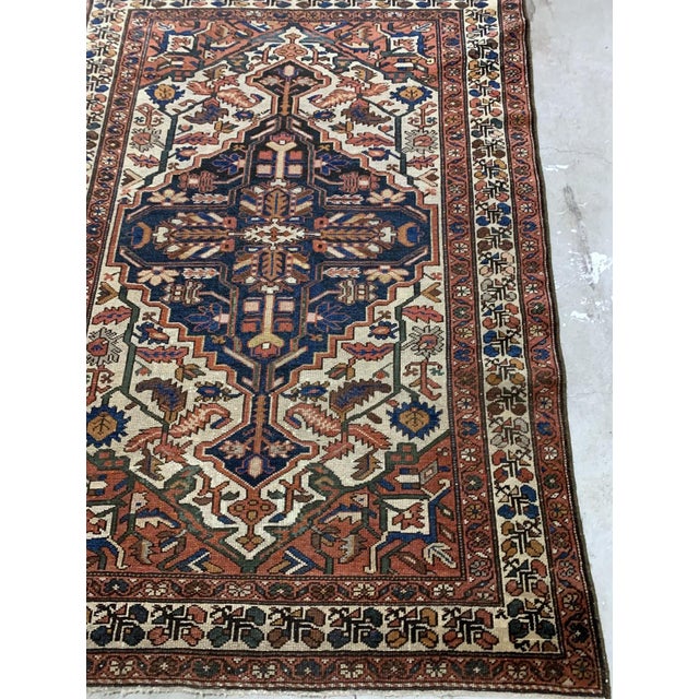 Handmade antique Middle Eastern Malayer rug in traditional design. The rug is from the beginning of 20th century in...