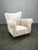 Exceptional Italian lounge armchair produced during the 1950s. Featuring a solid beech wood structure concealed beneath...