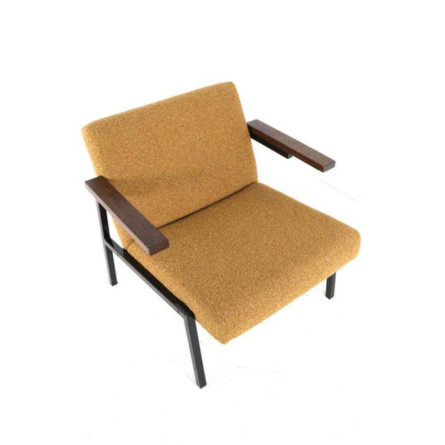 Experience the ultimate in dutch design with this iconic sz63 armchair, designed by the legendary martin visser for...