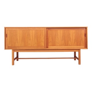 Vintage Cherry Wood Sideboard with Sliding Doors by Kurt Østervig for Tranekær Furniture, 1970s For Sale