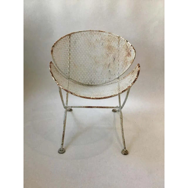 Pair of Salterini clam shell chairs. Needs to be repainted. Not marked Salterini.