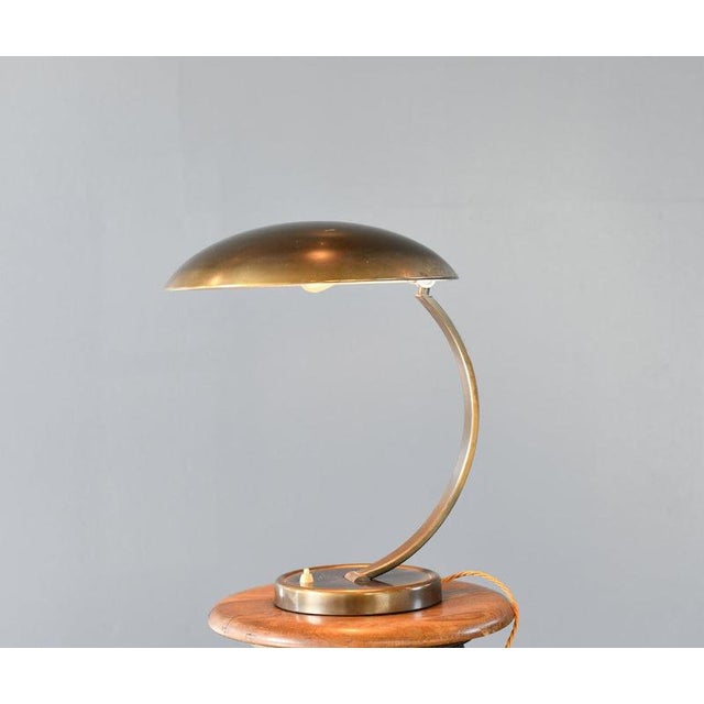 Mid Century Bauhaus Lamp By Kaiser Idell Model 6751 Circa 1950s Brass arm and shade - On/Off switch on the base -...