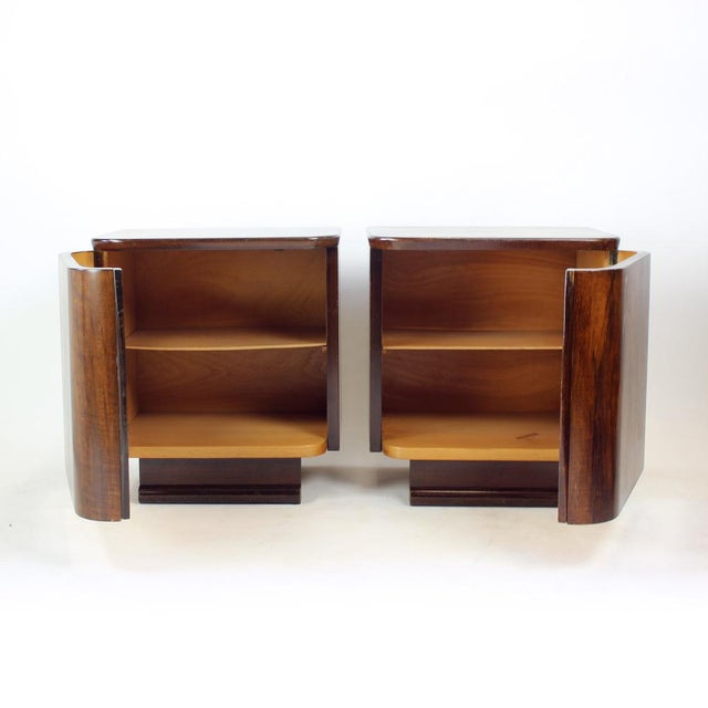 Wonderful pair of bedside tables produced by Pravenec in Czechoslovakia in 1957, with original manufacturer labels still...
