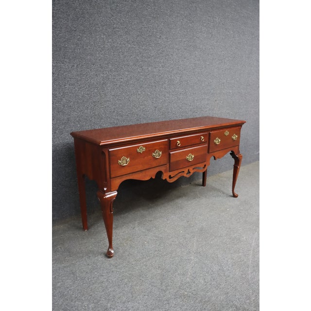 Classic Queen Anne–style sideboard by Pennsylvania House, made of solid cherry with a warm traditional finish. Features...