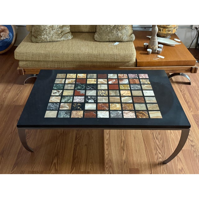 A stunning combination of 19th century elegance and modern design this coffee table features a Ne-classical specimen...